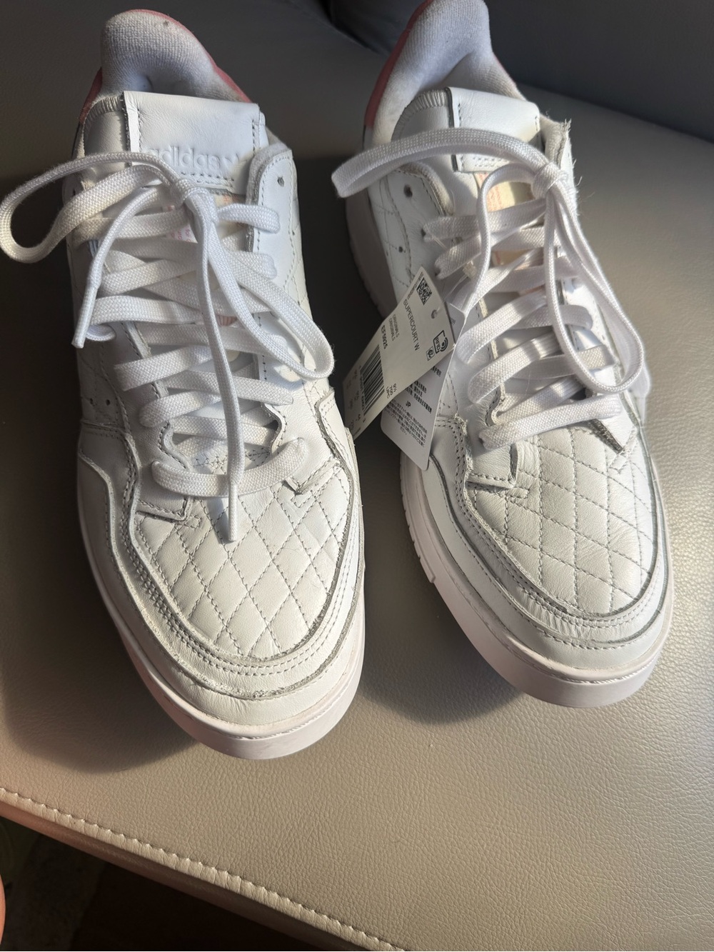 adidas Men’s White Quilted Low-Top Sneakers with Pink Heel Accent